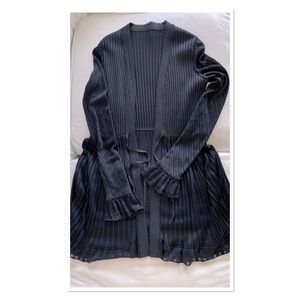 ALAIA ruffled ribbed-knit top